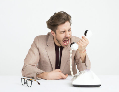Biznesmen kłótnia przez telefon
